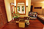 Cottage room showing TV